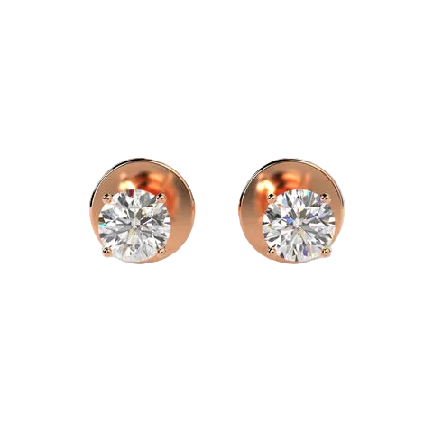 Rose gold earrings with clear gemstones on a light beige background