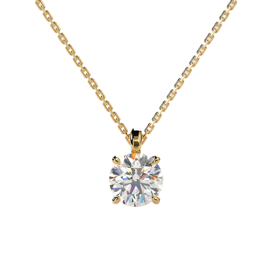 A yellow gold solitaire necklace with a round brilliant-cut diamond pendant, shown against a solid light beige background.