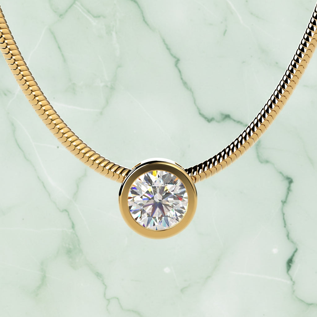 Gold necklace with a round diamond pendant on a beige background