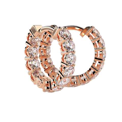 Rose gold hoop earrings adorned with clear pavé gemstones, displayed on a neutral beige background.
