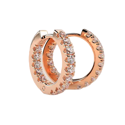 Rose gold hoop earrings with clear gemstones on a light beige background