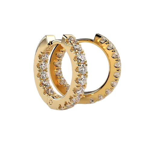 A pair of gold huggie hoop earrings adorned with clear pavé-set gemstones, displayed on a soft beige background.