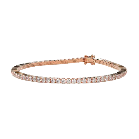 A rose gold tennis bracelet with a single row of round-cut clear gemstones, displayed on a solid light beige background.