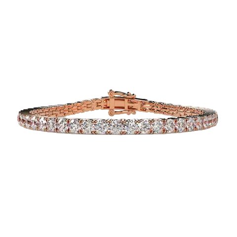 Rose gold bracelet with clear stones on a beige background