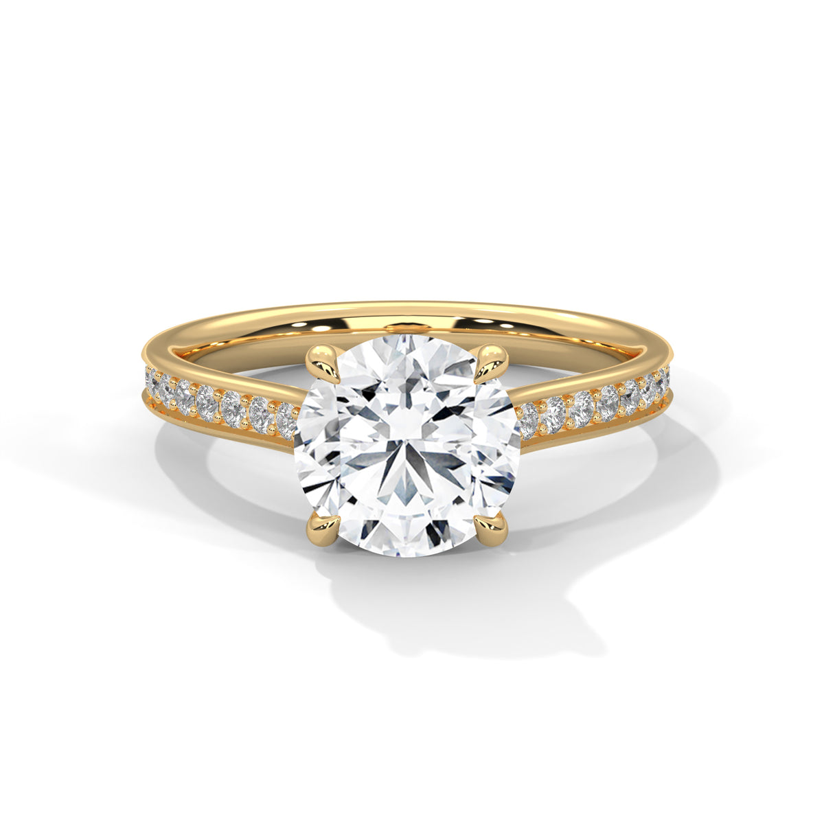 Gold ring with a large diamond and smaller diamonds on the band against a white background