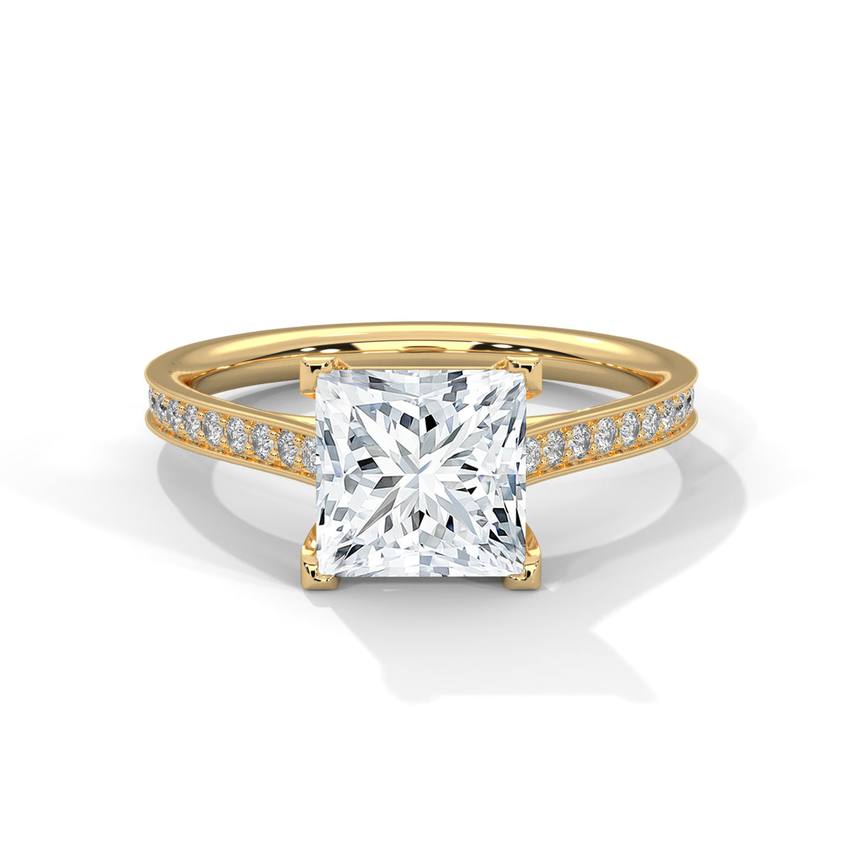 Gold ring with a large diamond and smaller diamonds on the band against a white background