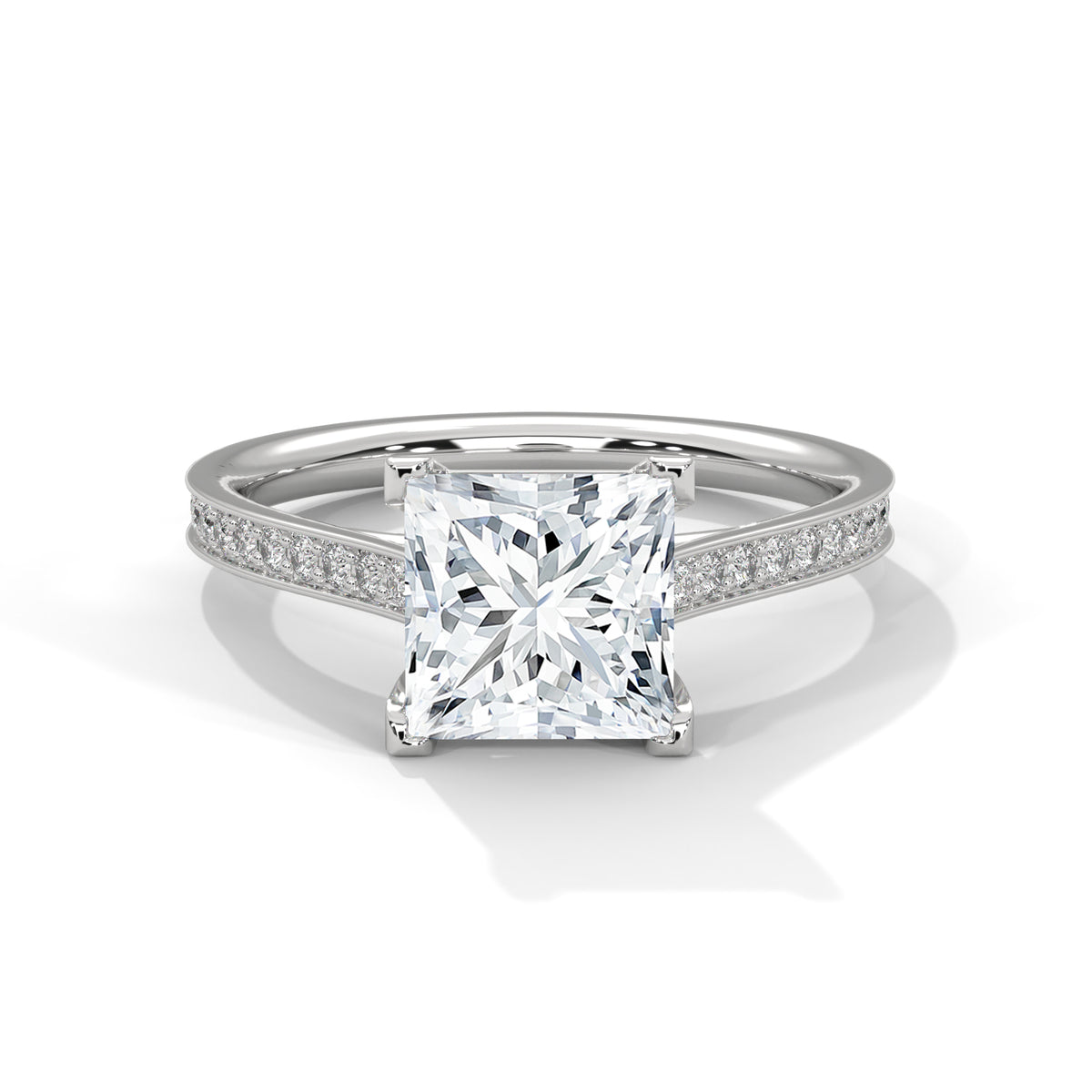 Diamond ring with a prominent princess-cut diamond on a white background