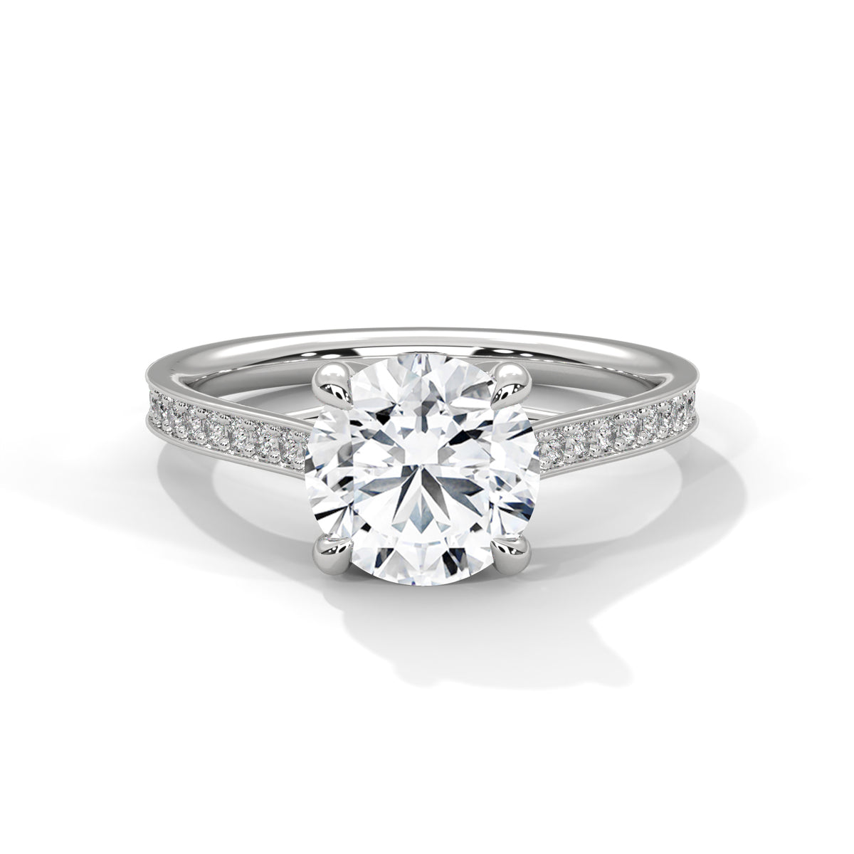 Diamond ring with a large central gemstone and smaller stones on a white background