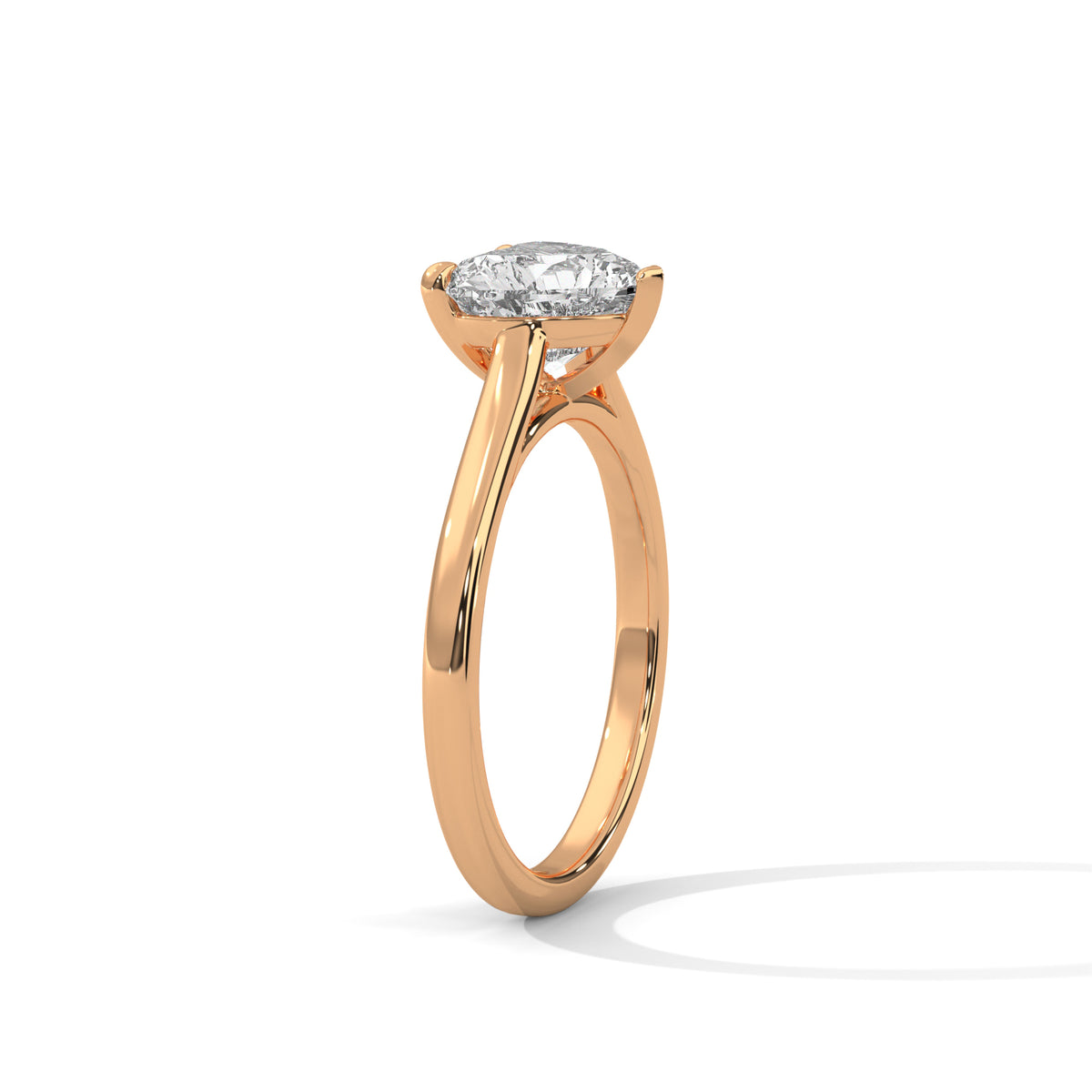 Rose gold ring with a diamond on a white background