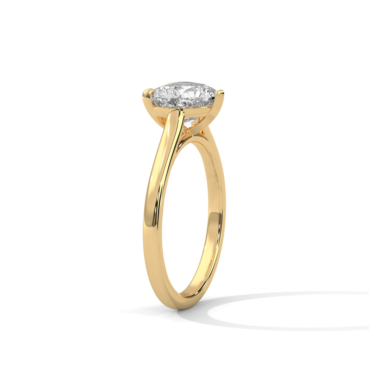 Gold ring with a diamond on a white background