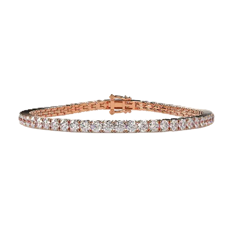 A rose gold tennis bracelet with a continuous row of clear round-cut gemstones, displayed on a neutral beige background.