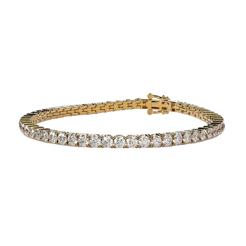 A yellow gold tennis bracelet featuring a continuous row of round-cut clear gemstones, displayed on a solid light beige background.