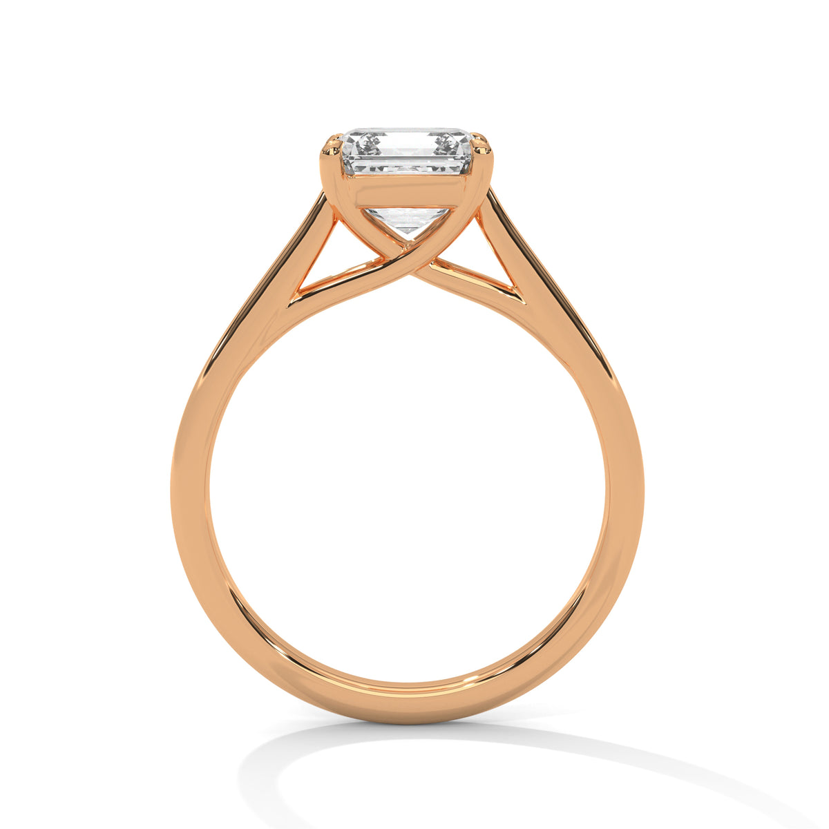 Gold ring with a diamond on a white background