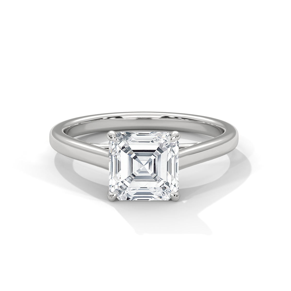 Silver ring with a square-cut diamond on a white background