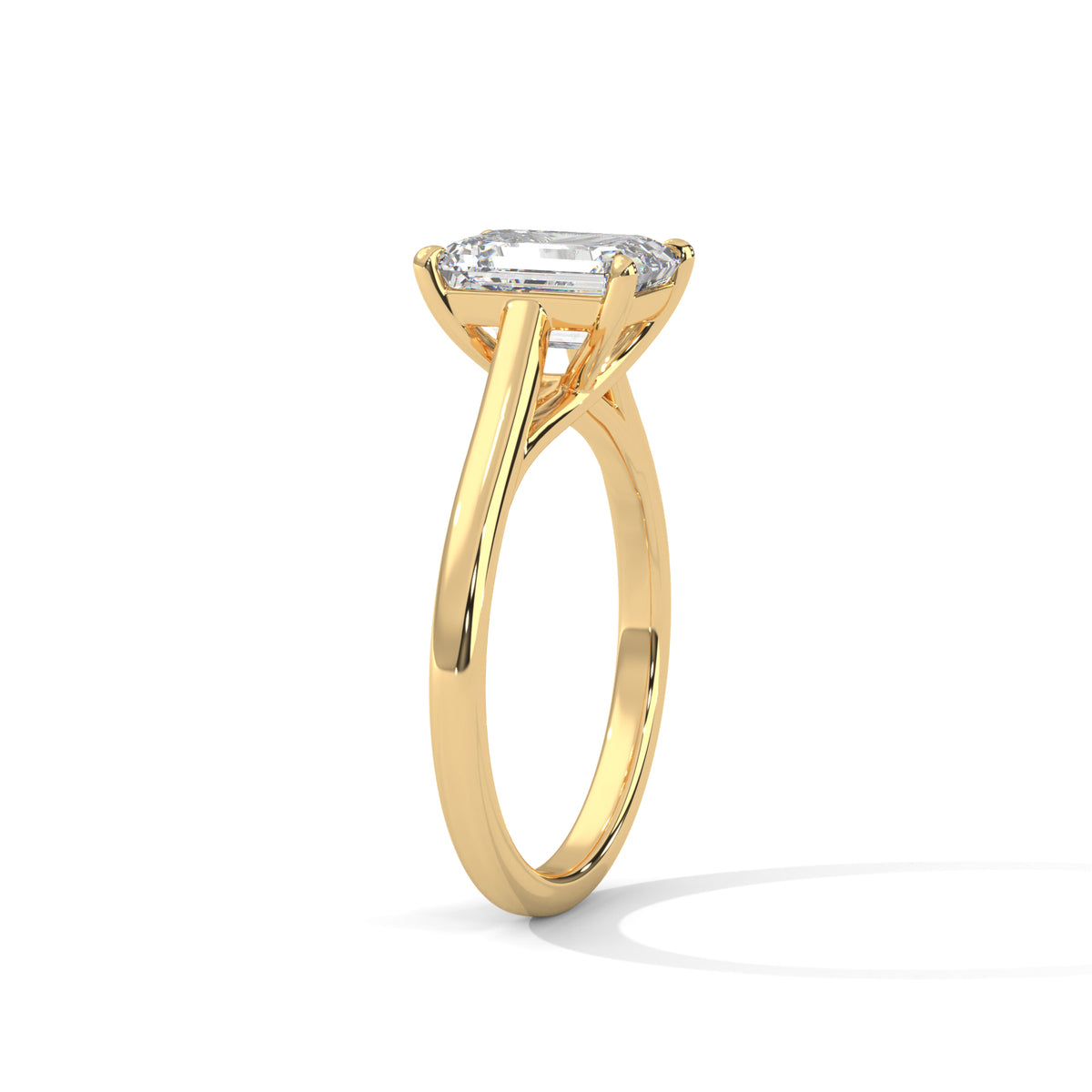 Gold ring with a diamond on a white background