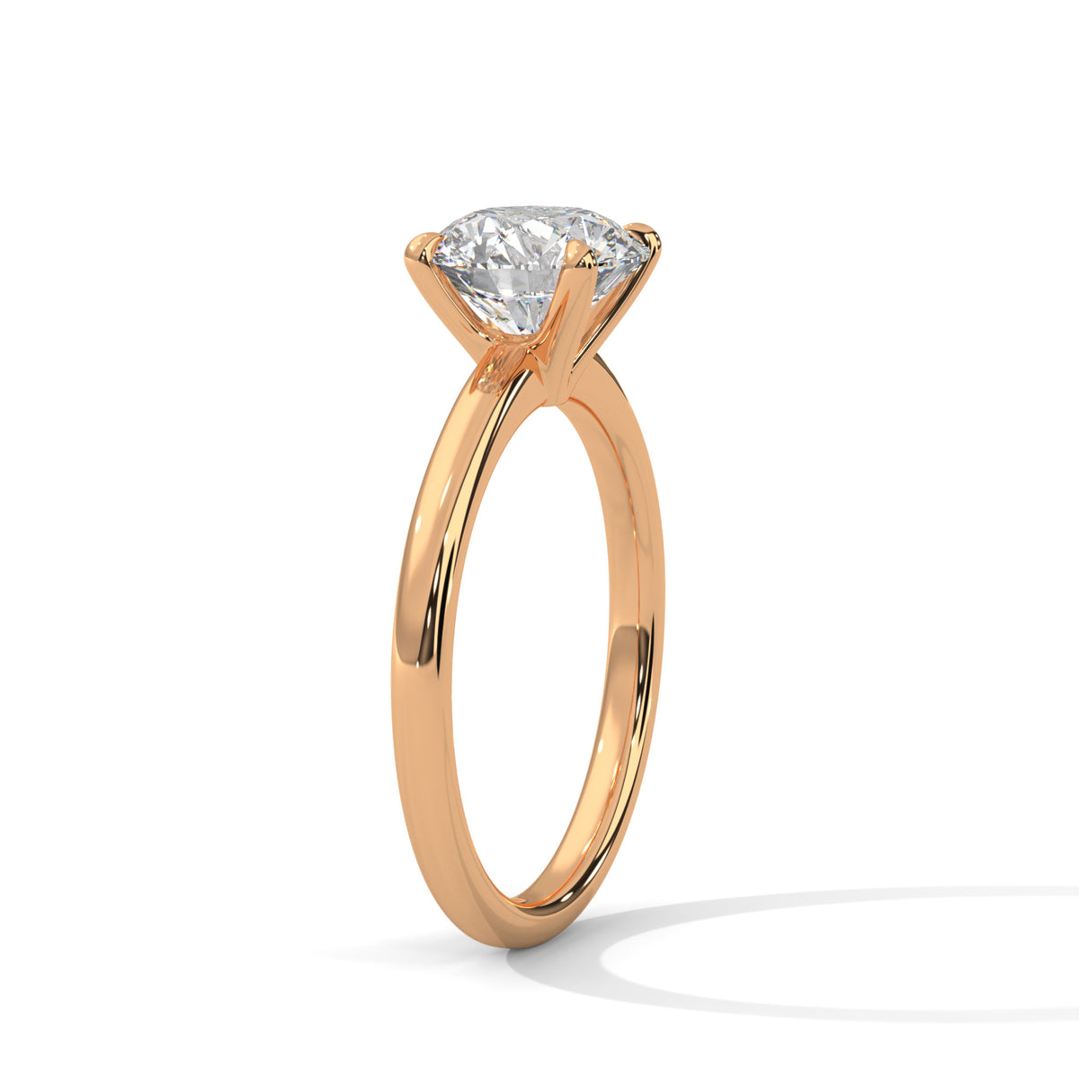 Rose gold ring with a diamond on a white background