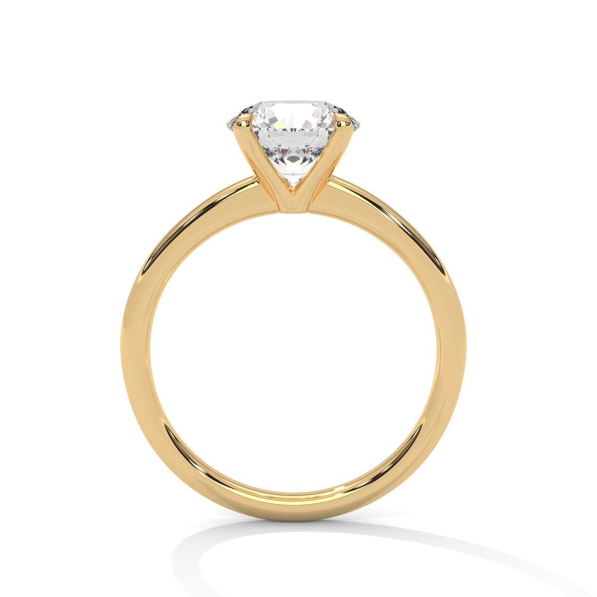 Gold ring with a diamond on a white background