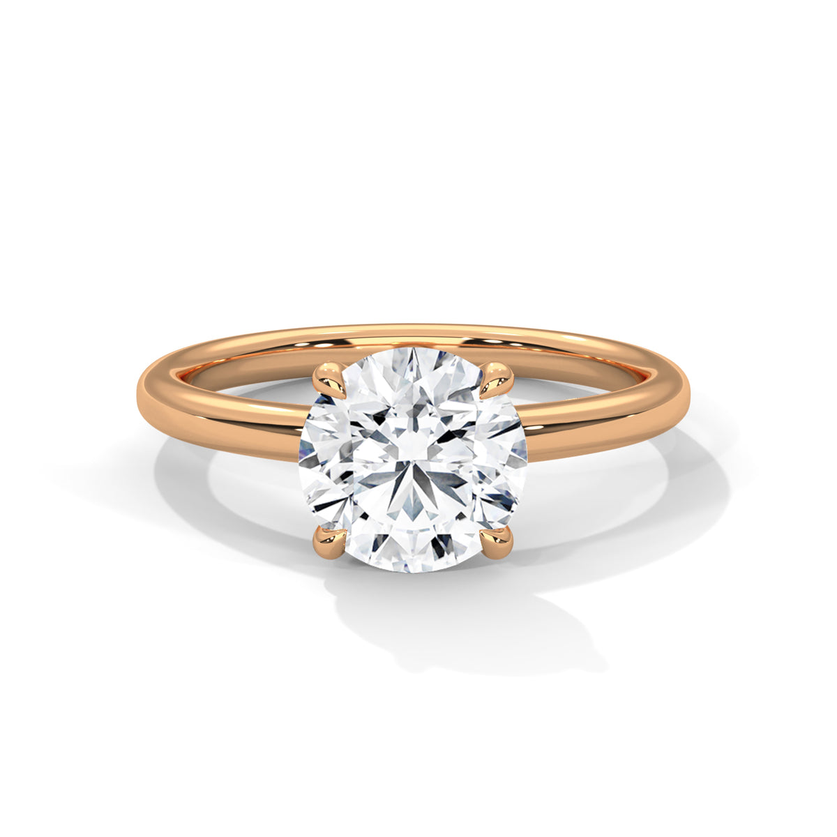 Rose gold ring with a diamond on a white background