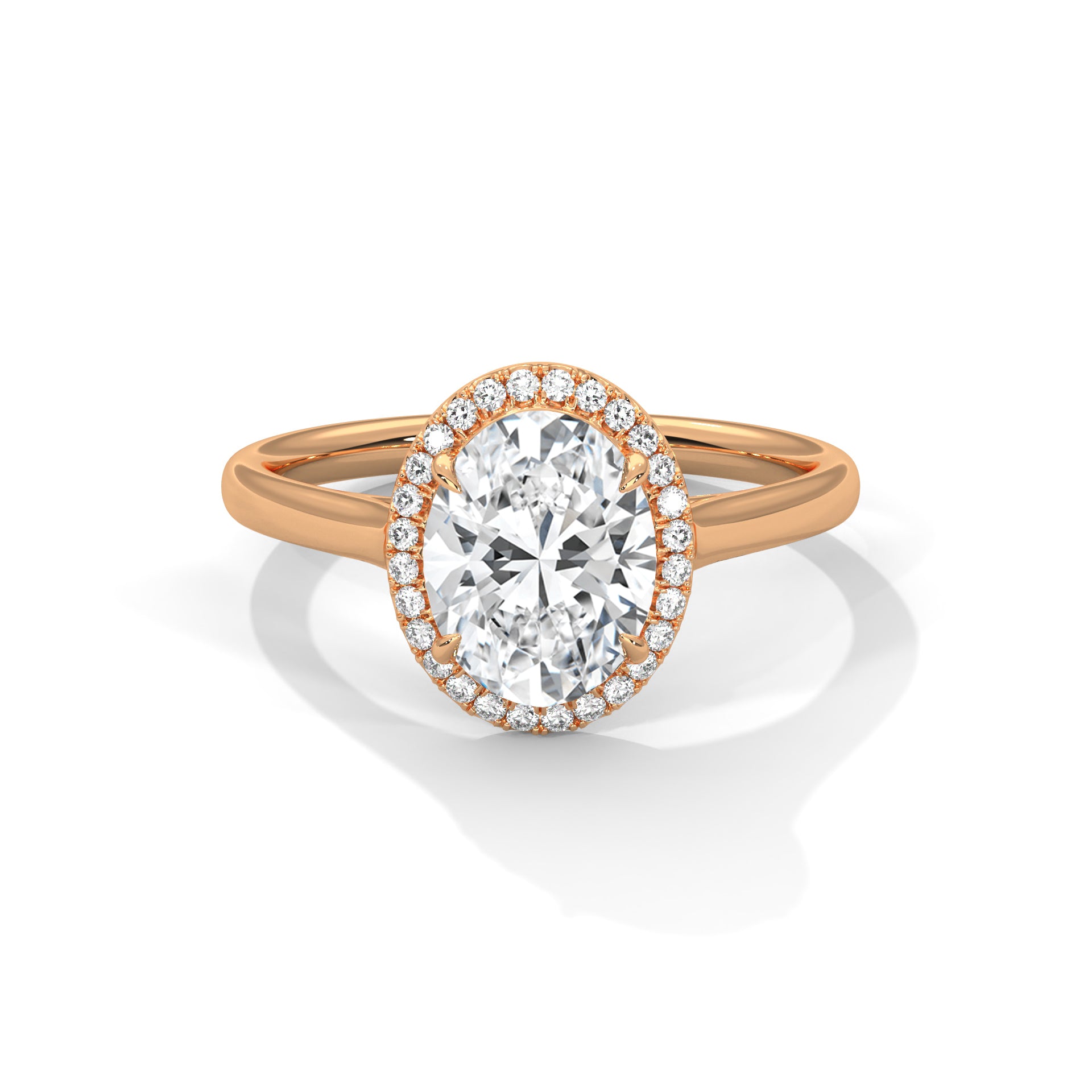 Rose gold ring with a large diamond and smaller diamonds around on a white background