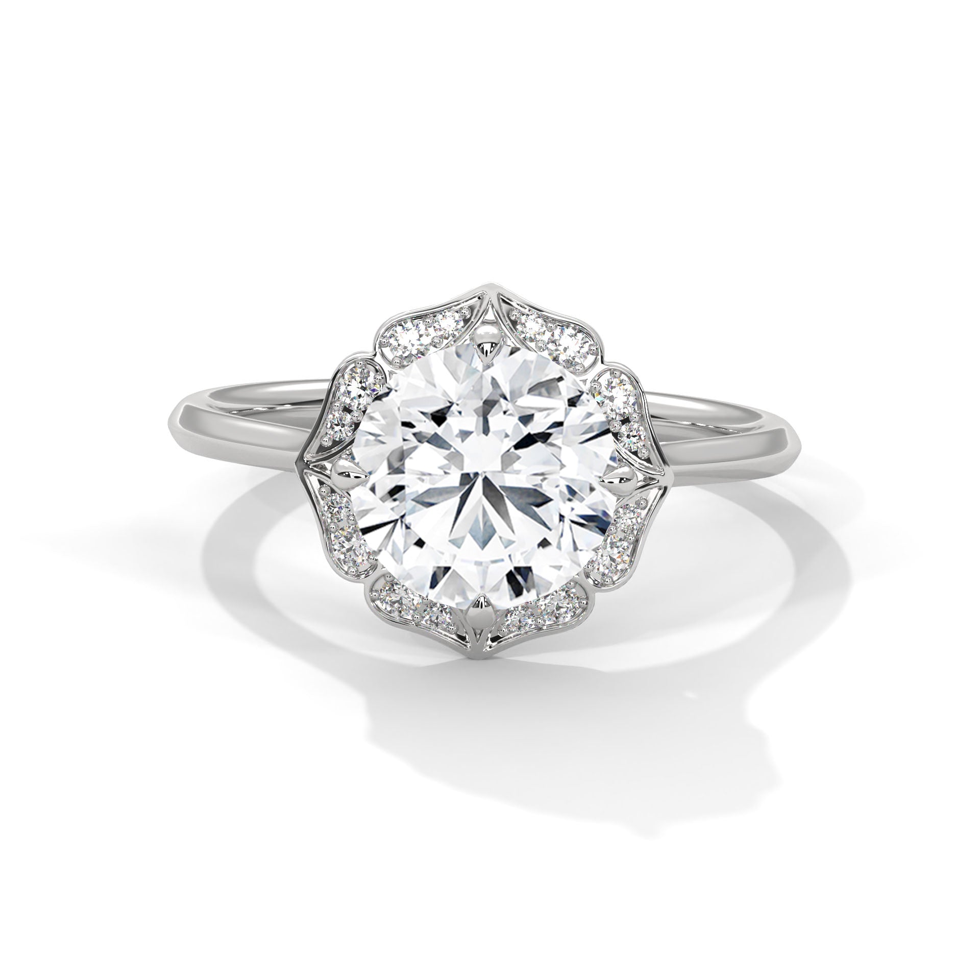 Diamond ring with a floral halo on a white background