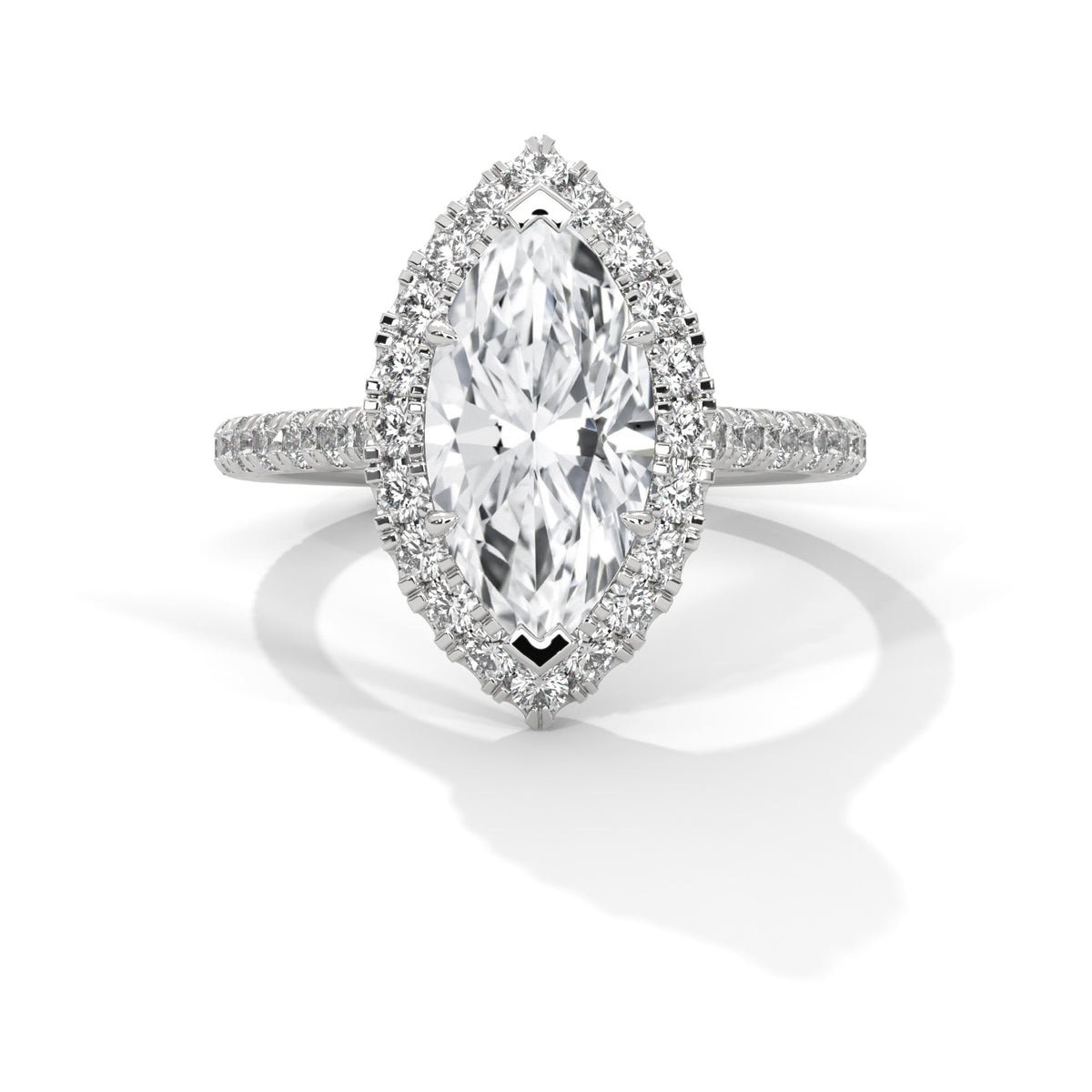Diamond ring with a marquise-shaped center stone on a white background