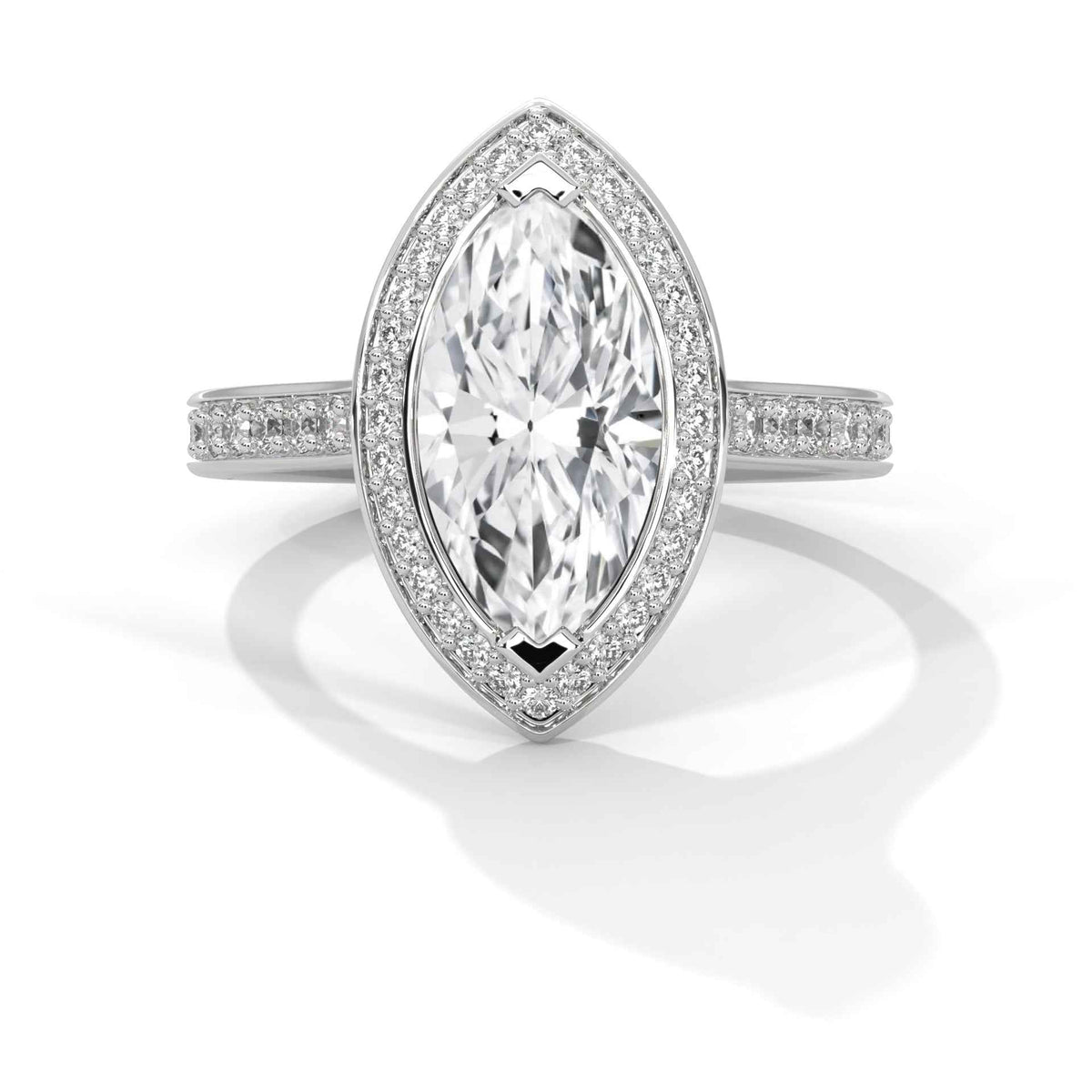 Diamond ring with a marquise-shaped center stone on a white background