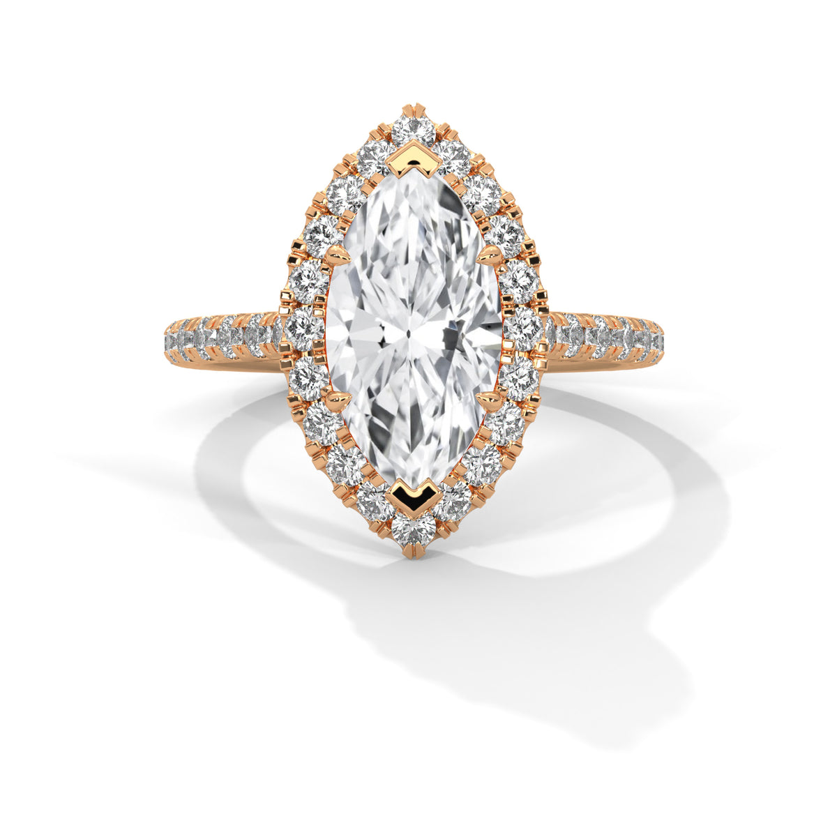 Gold ring with a large diamond and smaller diamonds on the band against a white background
