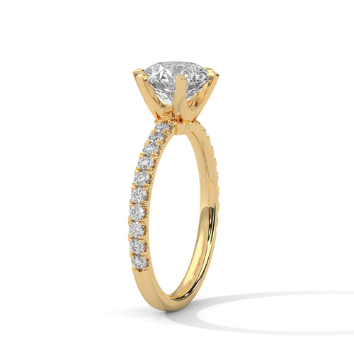 Gold ring with a diamond on a white background