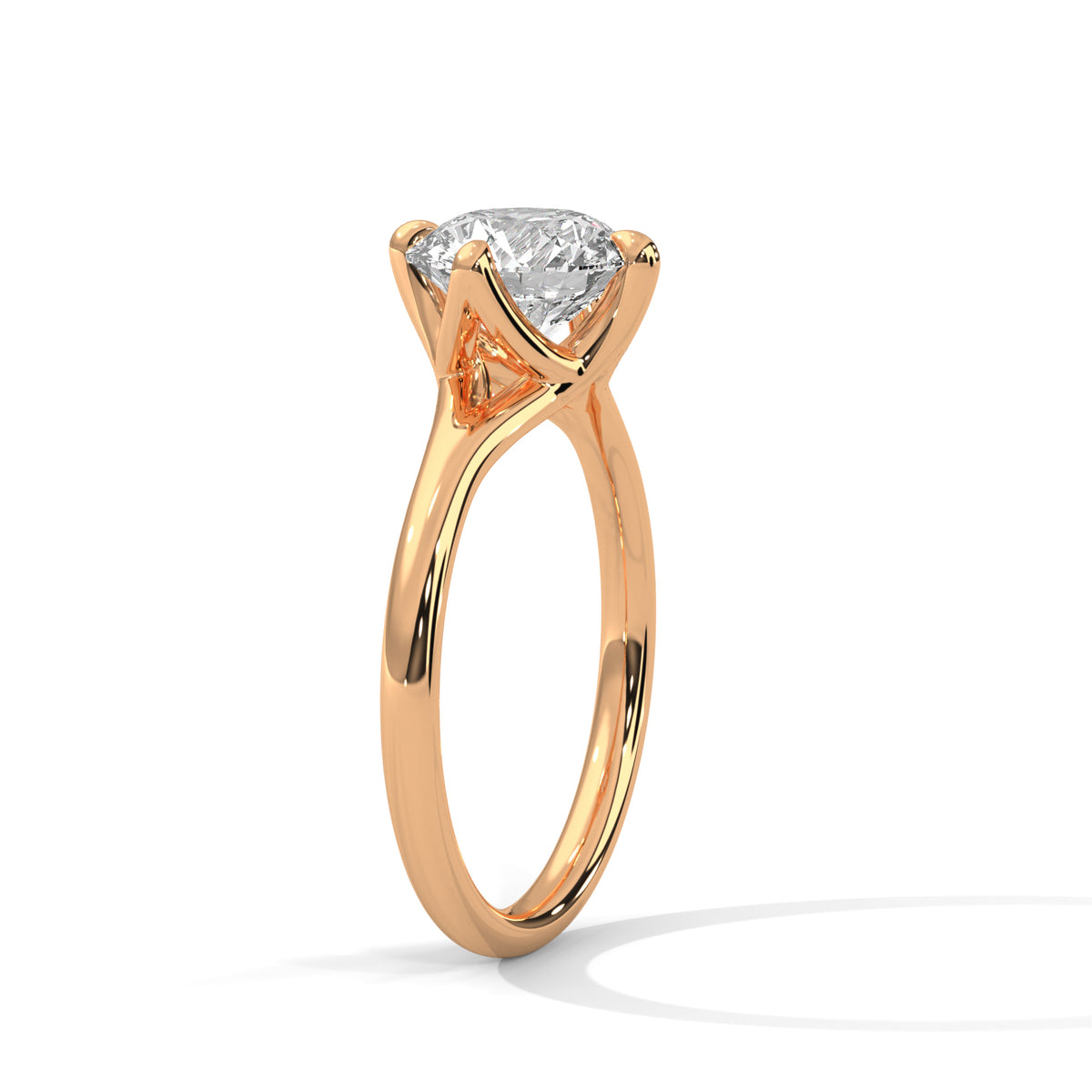 Rose gold ring with a diamond on a white background