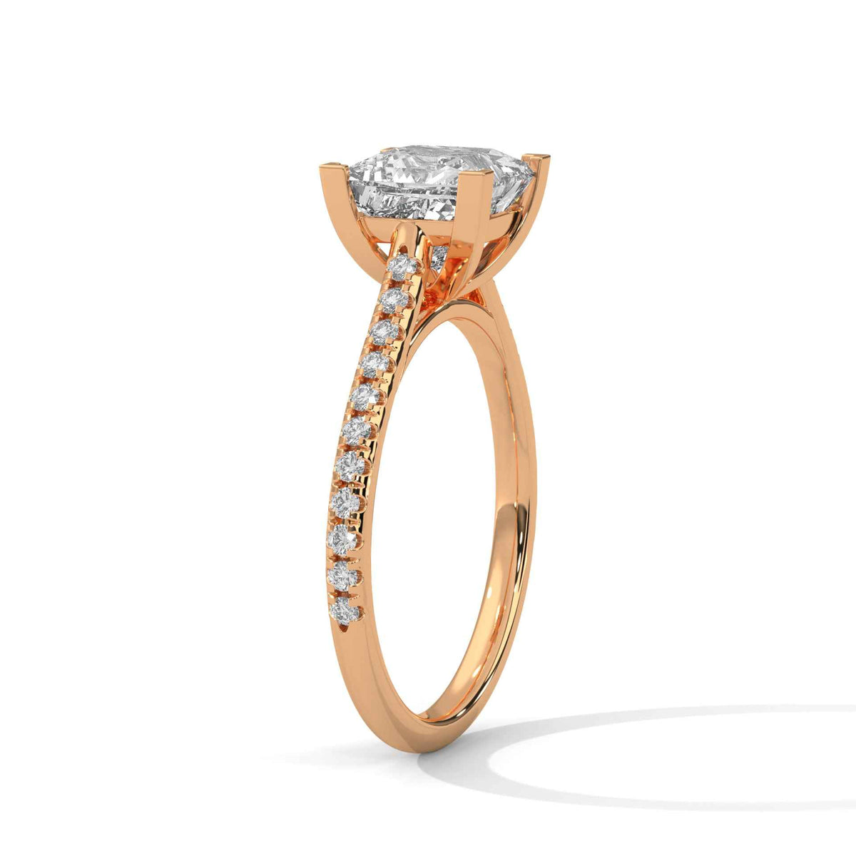 Rose gold ring with diamond accents on a white background