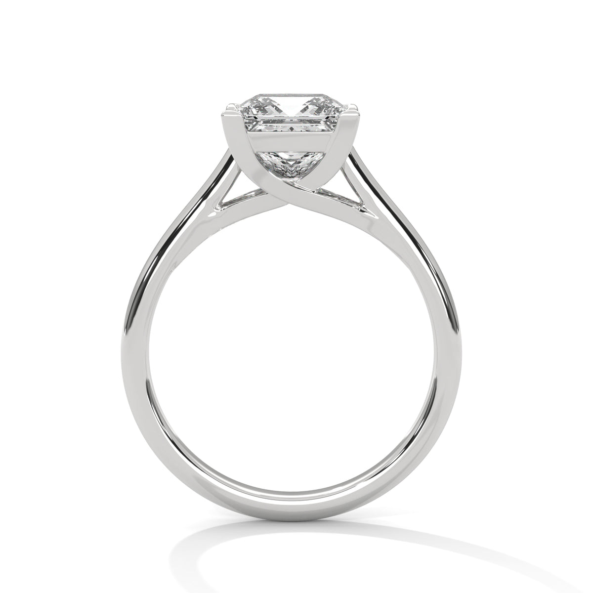 Silver ring with a diamond on a white background