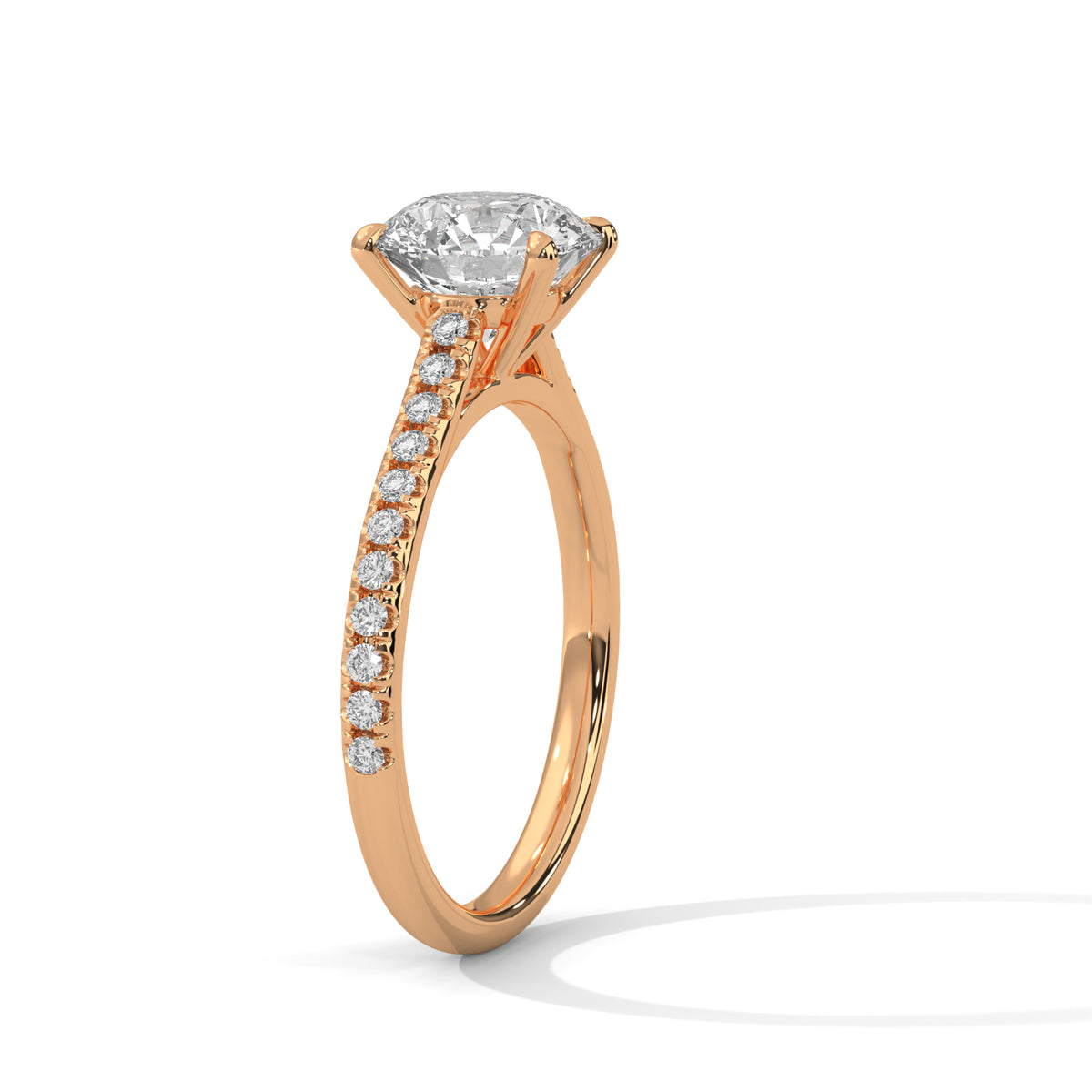 Rose gold ring with a large diamond and smaller diamonds on the band against a white background