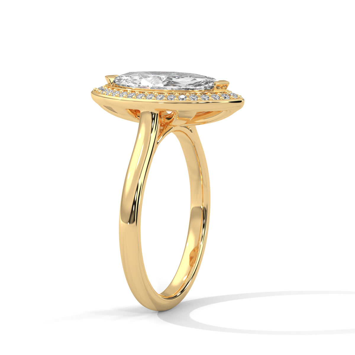 Gold ring with a diamond on a white background