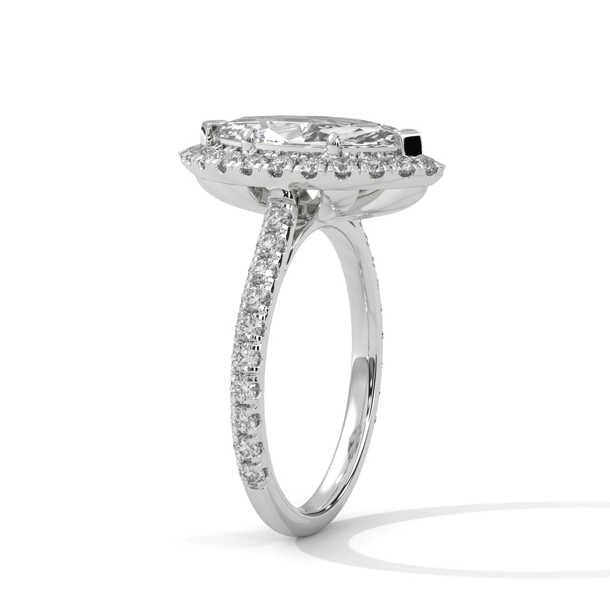 Silver ring with a diamond on a white background