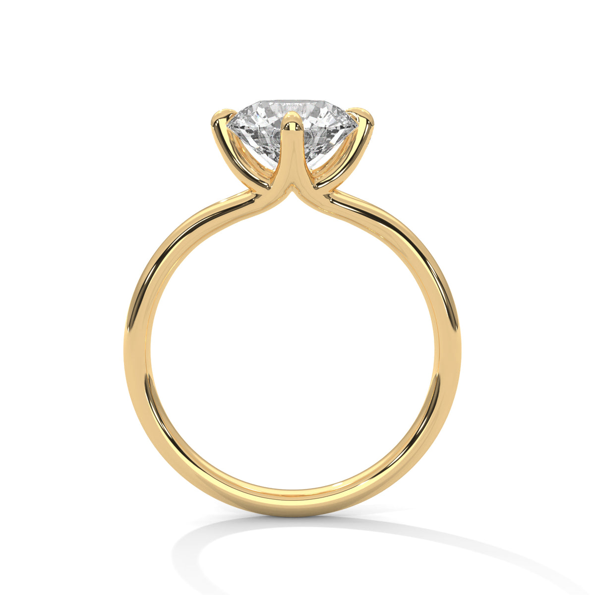 Gold ring with a diamond on a white background