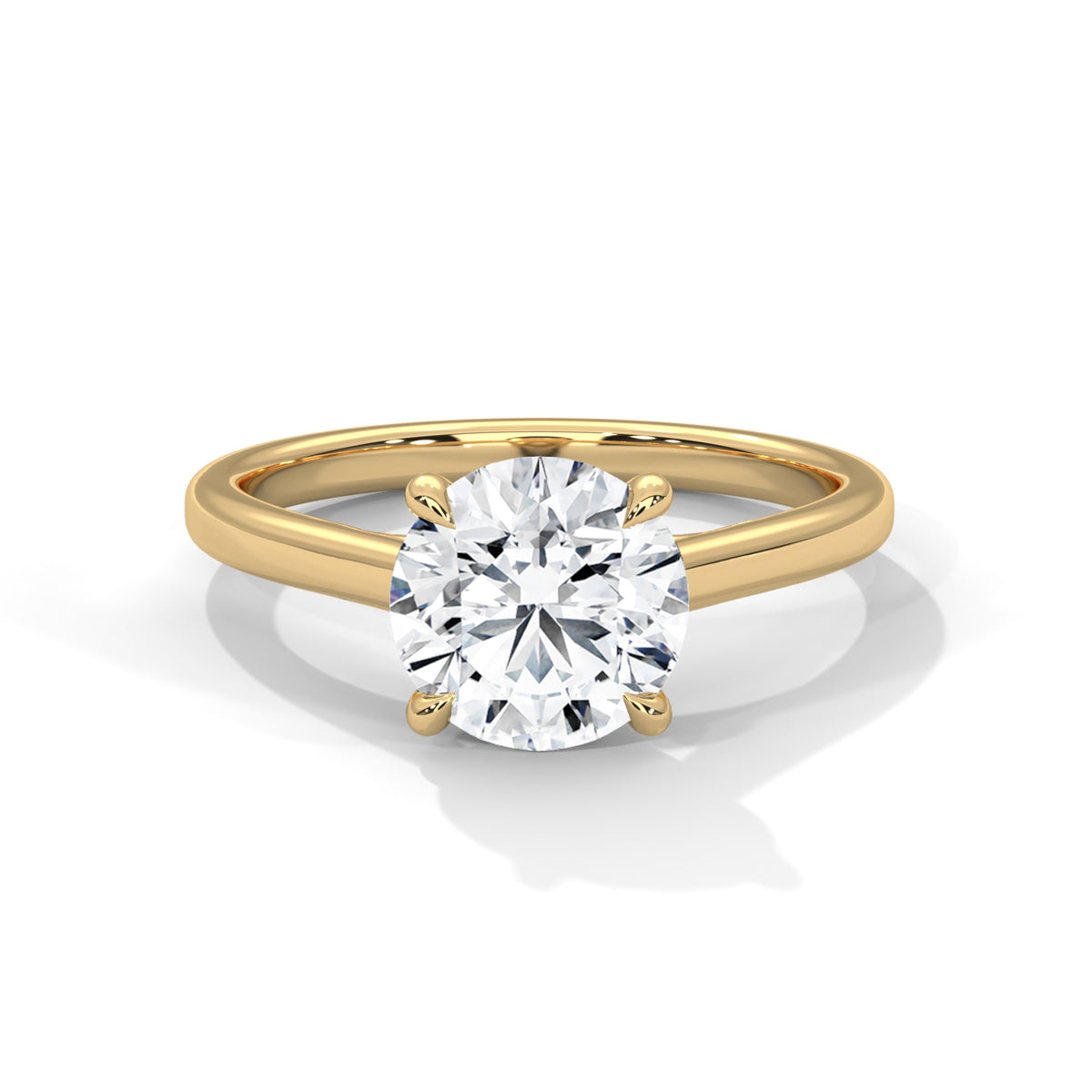 Gold ring with a large diamond on a white background