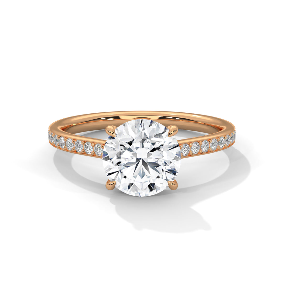 Rose gold ring with a large diamond and smaller diamonds on the band against a white background