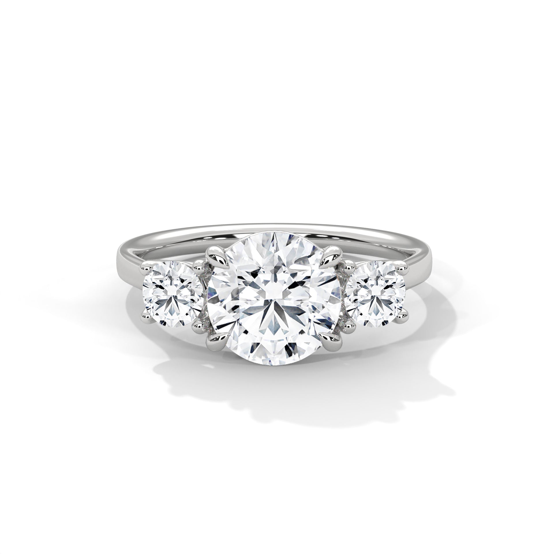 Diamond ring with three circular diamonds on a white background