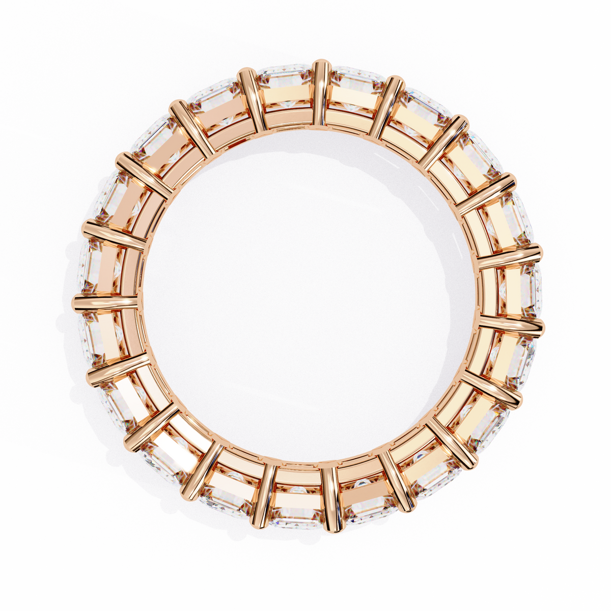 Rose gold ring with clear gemstones on a white background