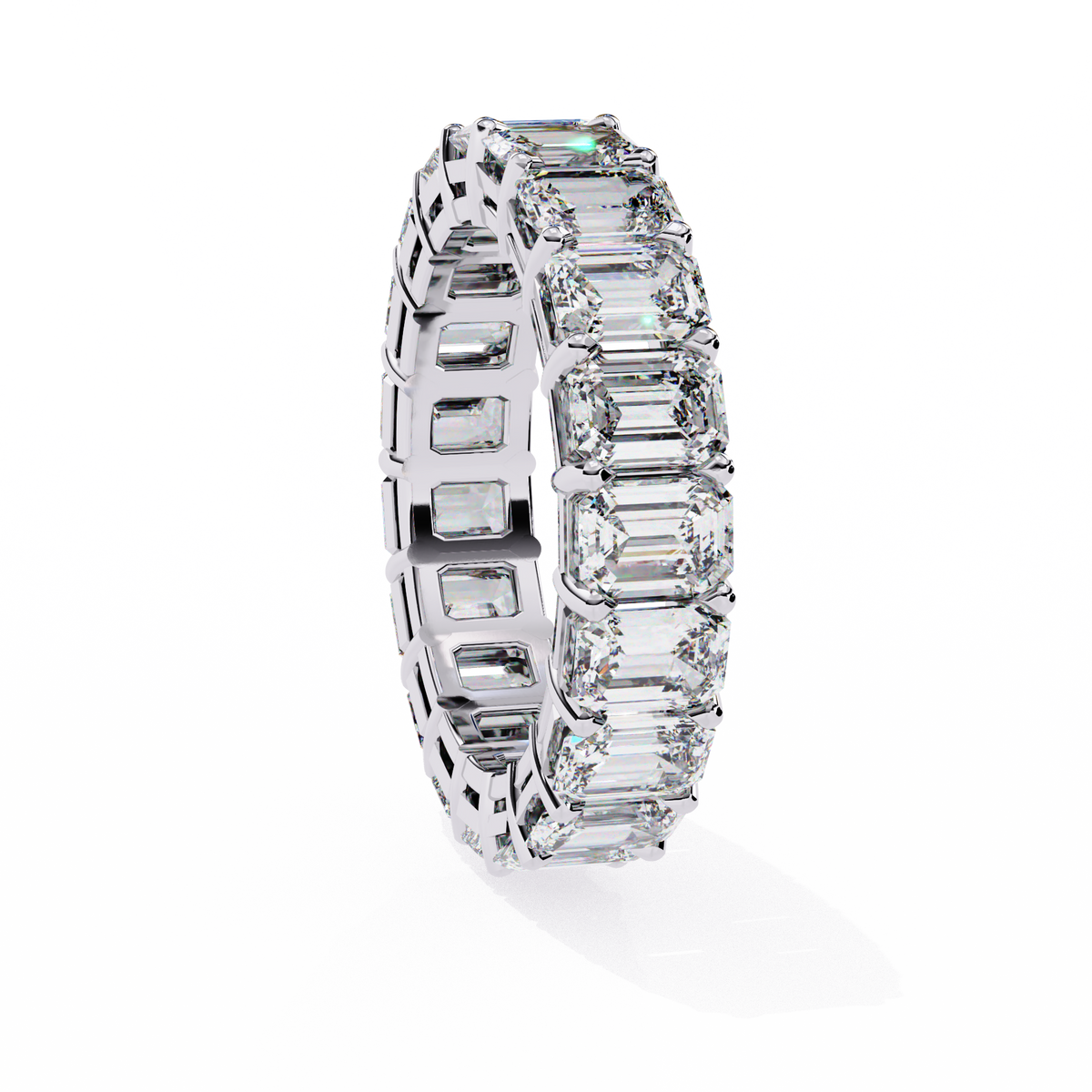 Eternity ring with emerald-cut diamonds on a white background