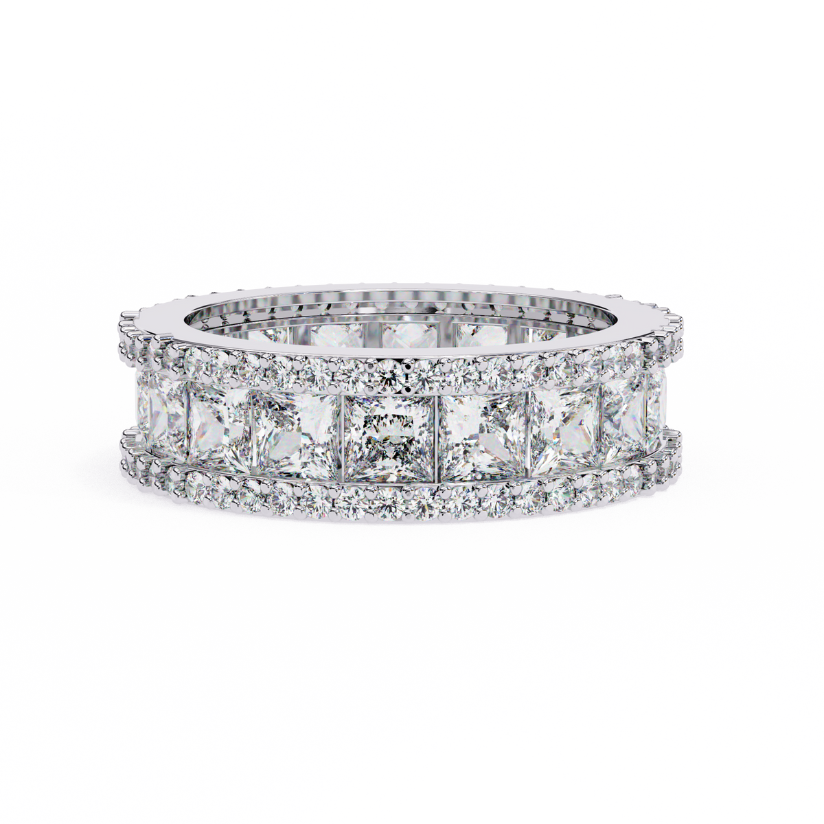 Diamond ring with rectangular stones on a white background