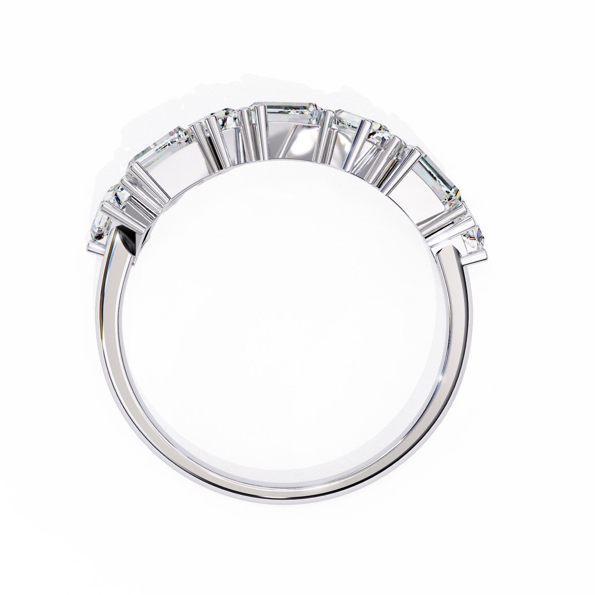 Diamond ring with baguette-cut stones on a white background