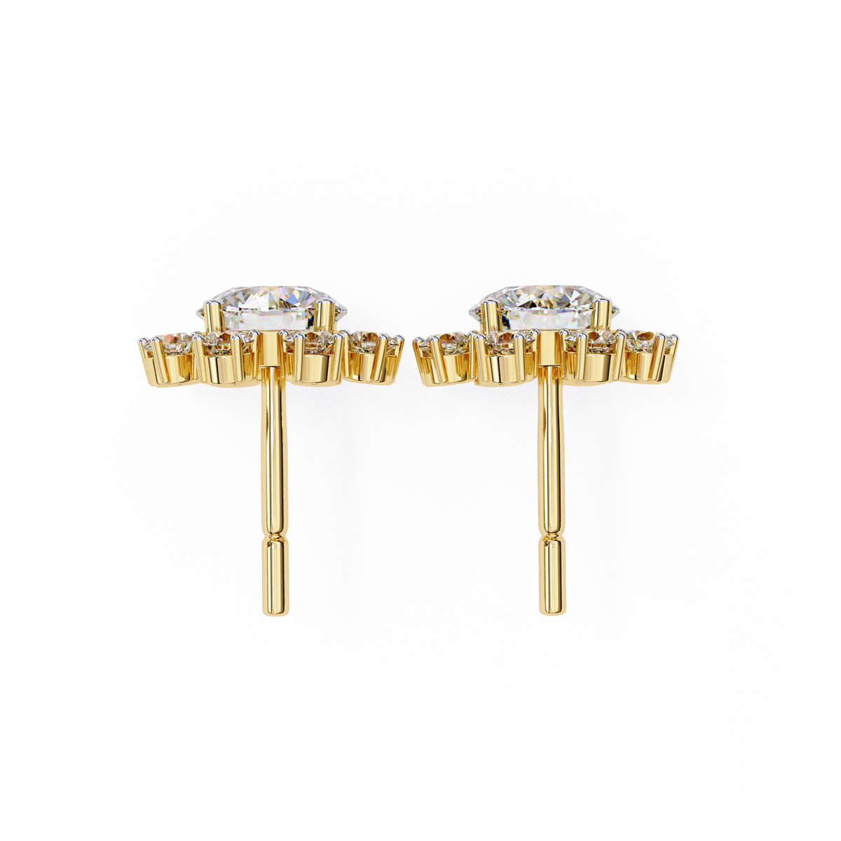 Gold earrings with clear gemstones on a white background