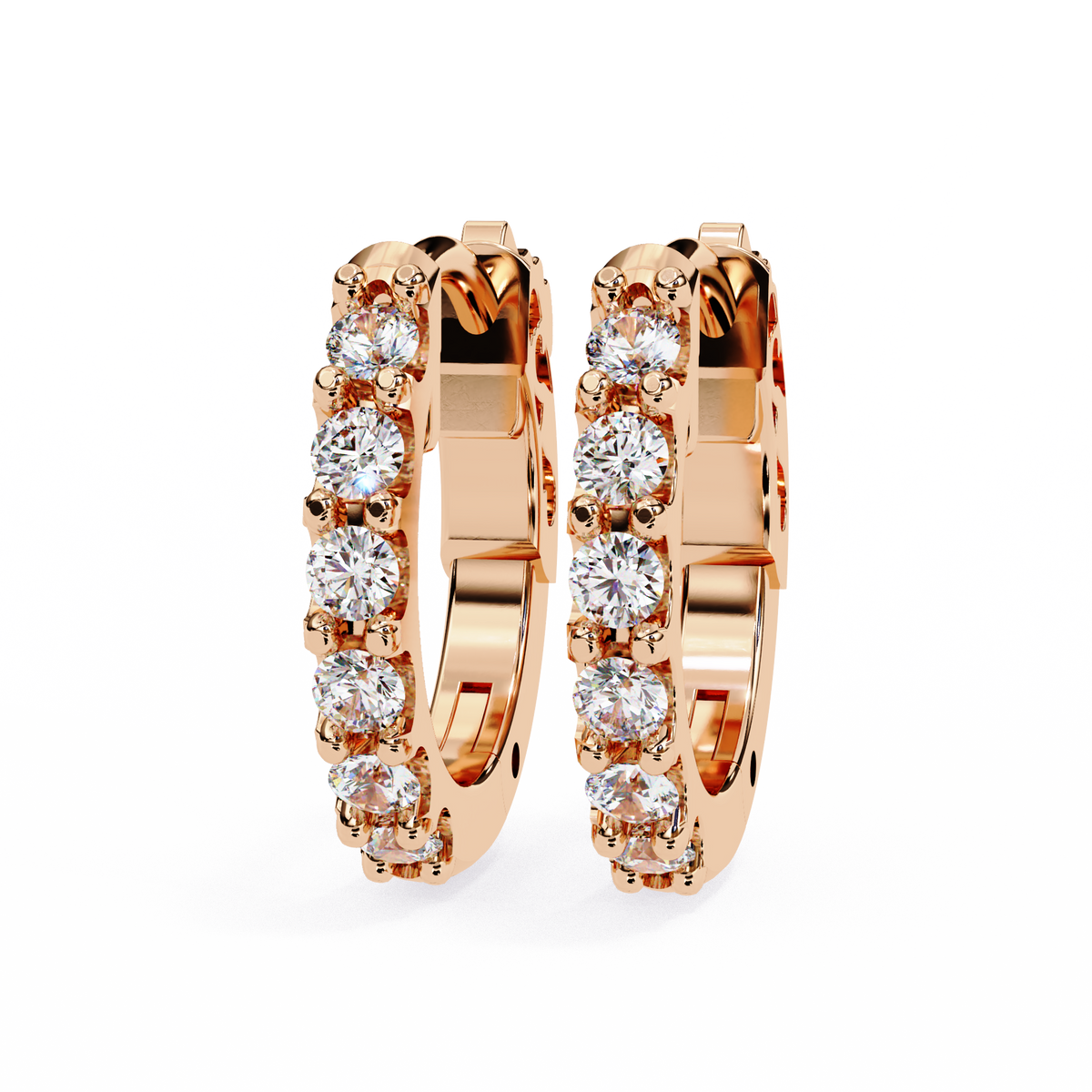 Rose gold hoop earrings with clear gemstones on a white background