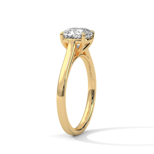 Gold ring with a diamond on a white background