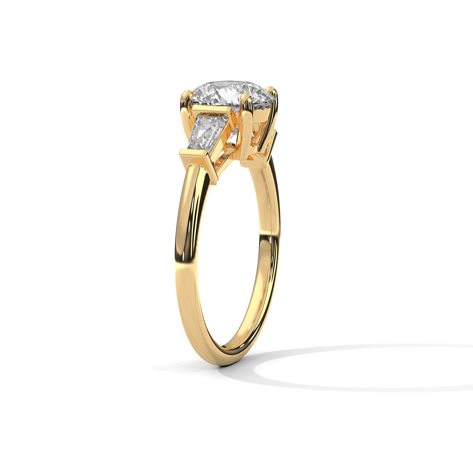 Round Three-Stone Engagement Ring with Tapered Baguettes