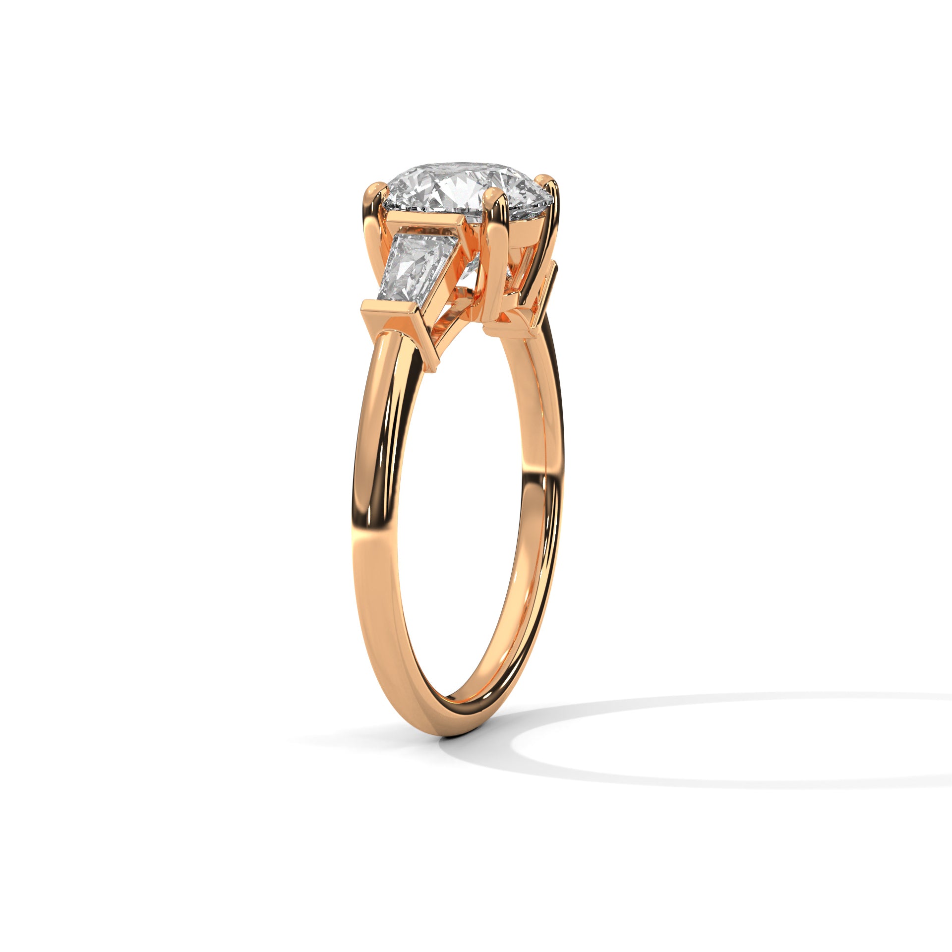 Round Three-Stone Engagement Ring with Tapered Baguettes