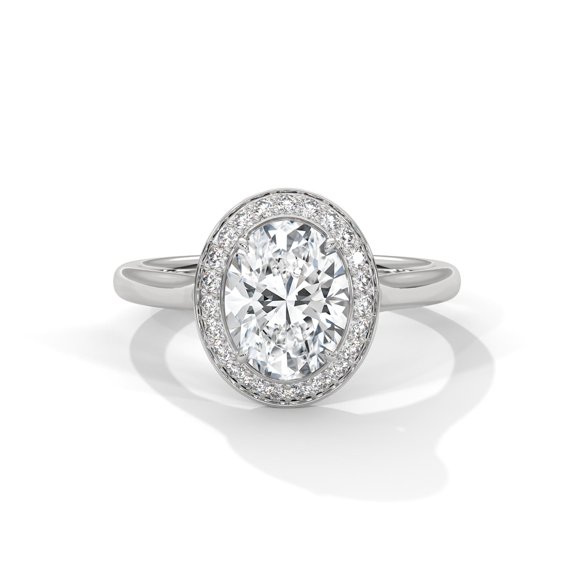Diamond ring with a halo on a white background