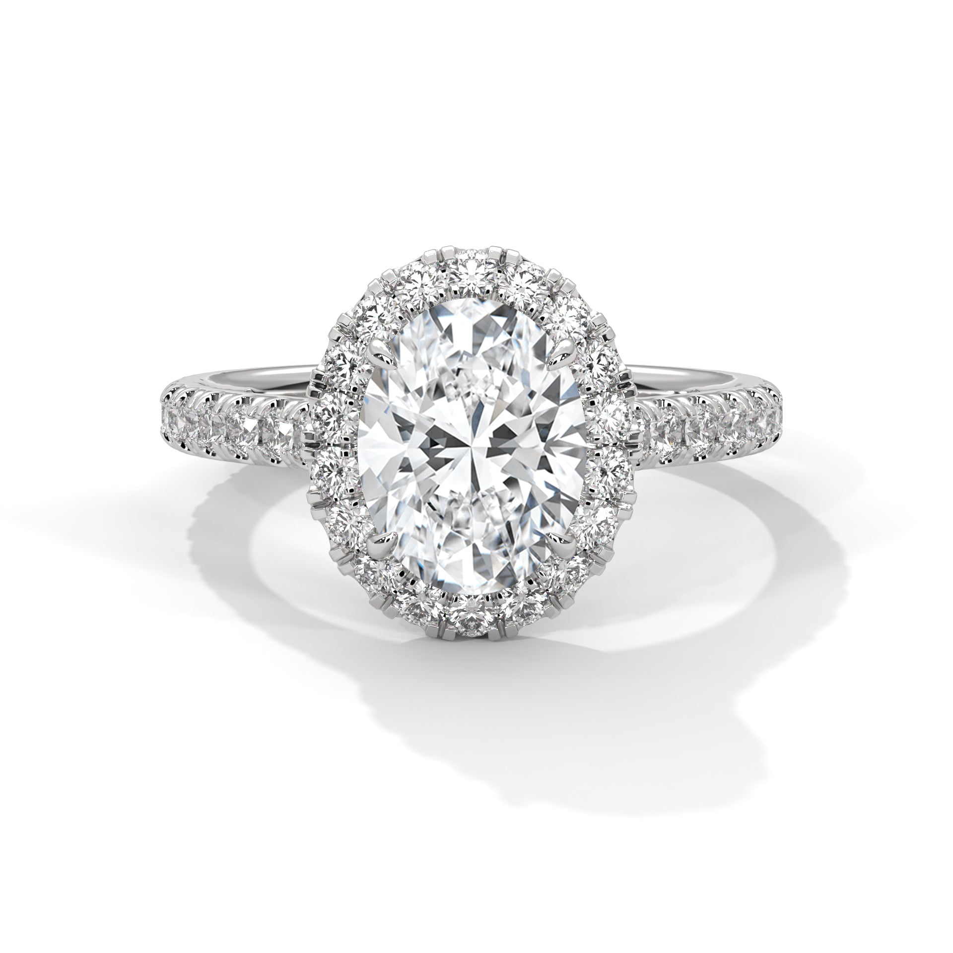 Diamond ring with a large central gemstone and smaller stones around on a white background
