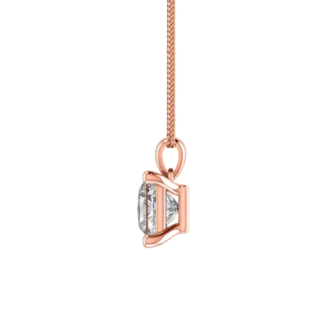 Rose gold pendant with a clear gemstone on a white background